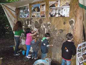 mud sculpting at the secret village